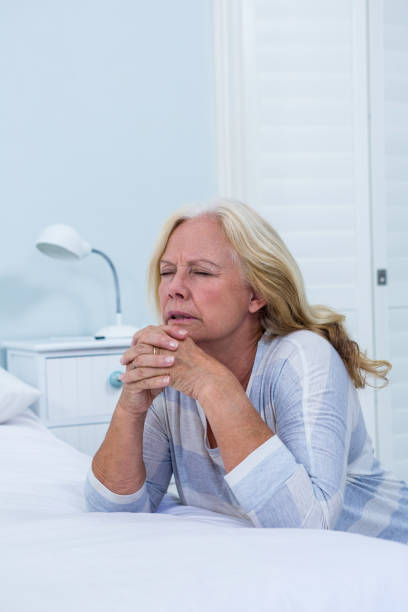 istock Woman praying in bedroom 667511380