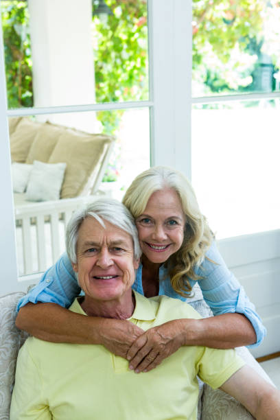 istock Happy senior couple embracing 667514420