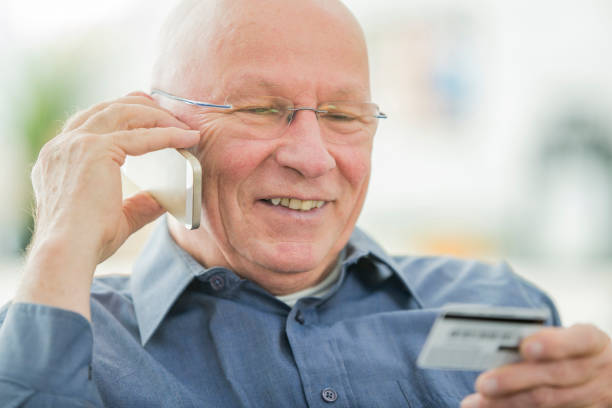 istock Senior Man With Credit Card 667520492
