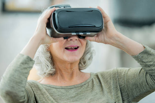 istock Senior Woman With VR 667520494