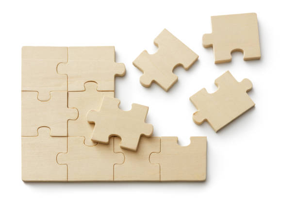 Toys: Wooden Jigzaw Puzzle Isolated on White Background