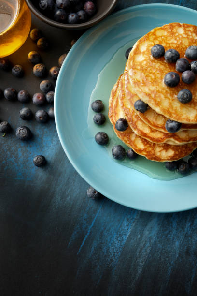 istock Breakfast: Pancakes, Syrup and Blueberries Still Life 667524718