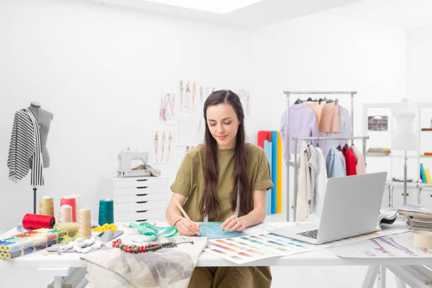istock fashion designer drawing a concept 667524778