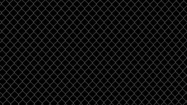 istock steel wire fence isolated on black background 667528834