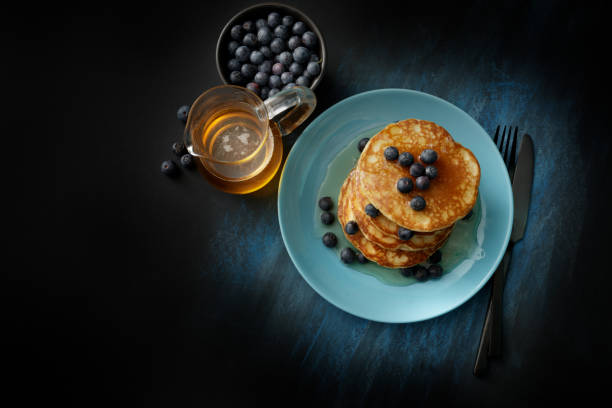 istock Breakfast: Pancakes, Syrup and Blueberries Still Life 667532098