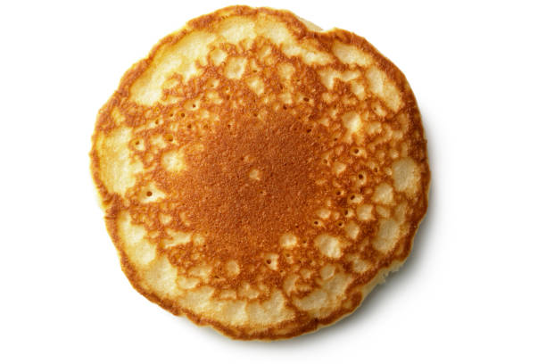 śniadanie: pancake izolowane na białym tle - pancake zdjęcia i obrazy z banku zdjęć