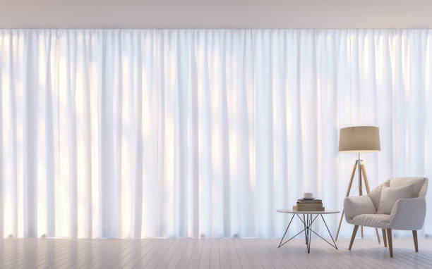 Modern white living room minimal style 3D rendering Image Modern white living room minimal style 3D rendering Image.There are decorate room with white translucent curtain and white armchair curtain stock pictures, royalty-free photos & images