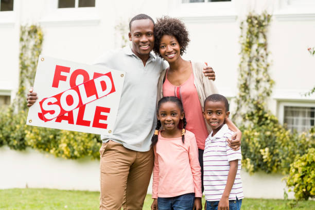 istock Happy family standing together 667541808