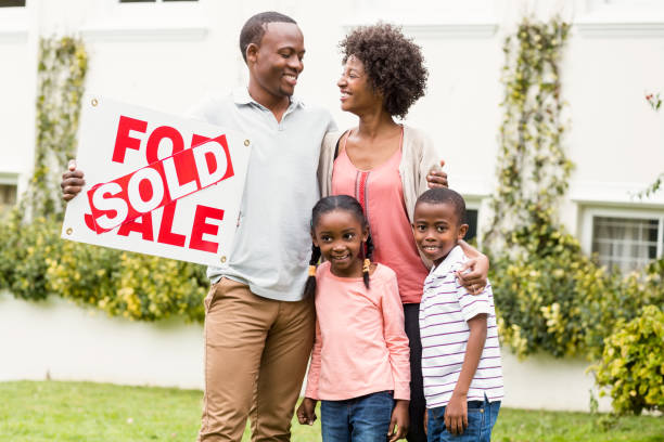 istock Happy family standing together 667541866