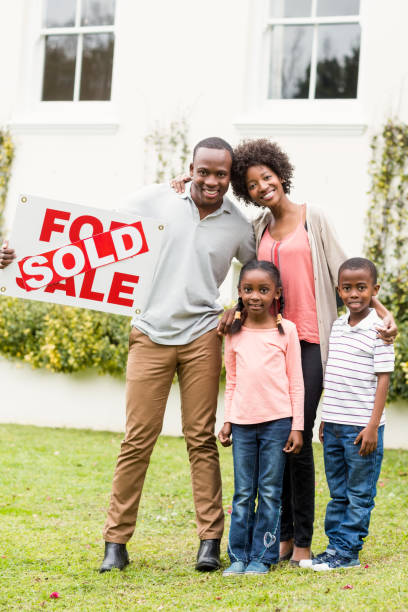 istock Happy family standing together 667541984