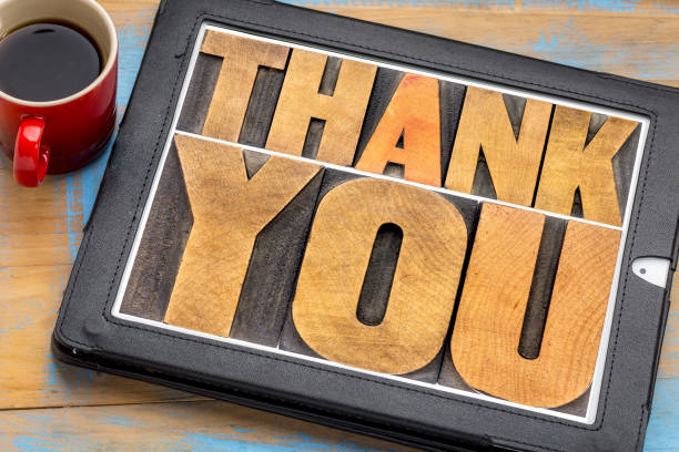 istock thank you on digital tablet 667545168