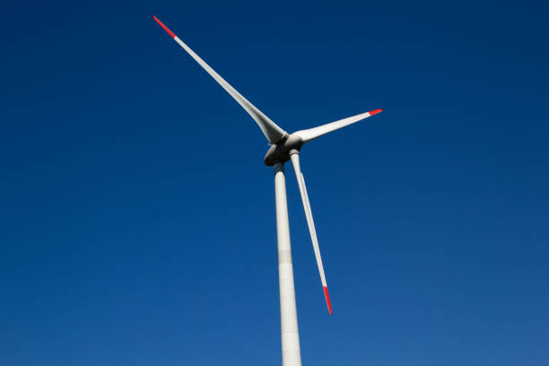 Horizontal axis wind turbine in the country on a cloudy day, electrical power green production