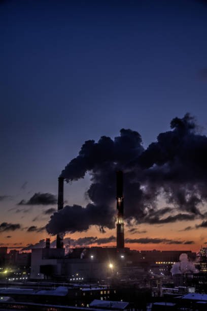 istock City. Smoke from the pipes. 667548776
