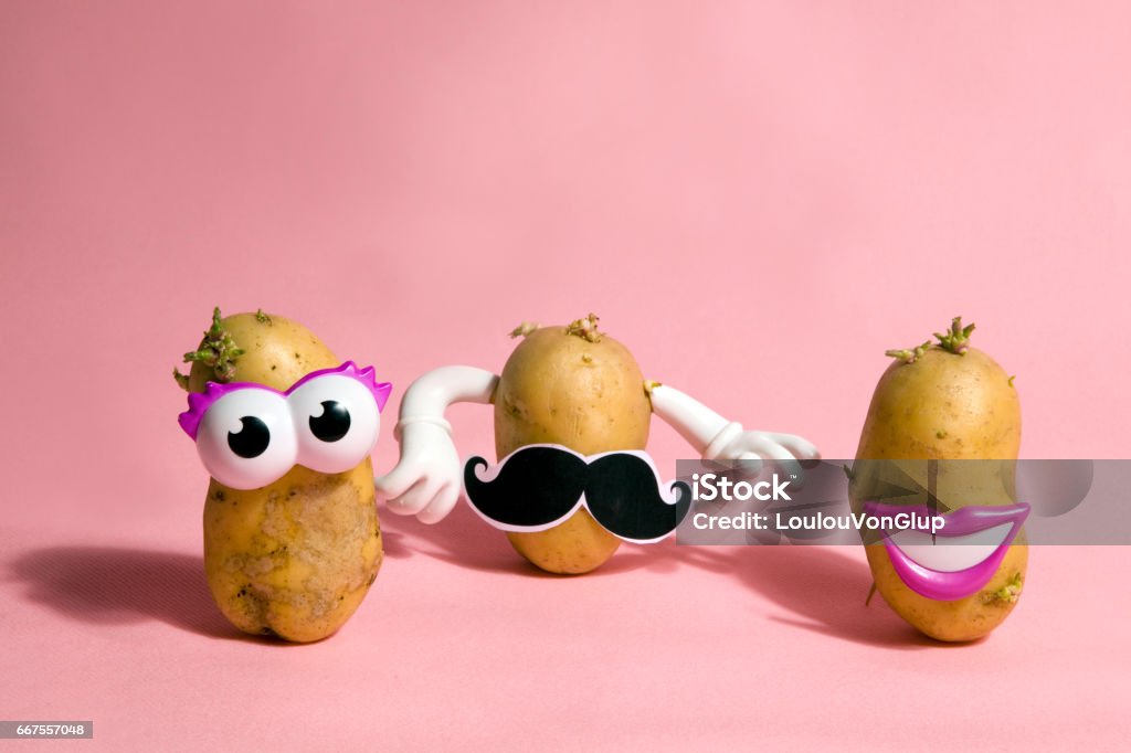 Mustache potatoes a pop and minimal potato portrait on a pink background Humor Stock Photo