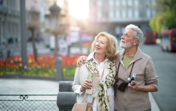 istock Senior couple exploring the city 667557946