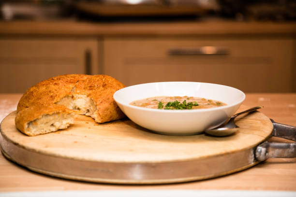 istock Homemade soup and cheese bread 667564204
