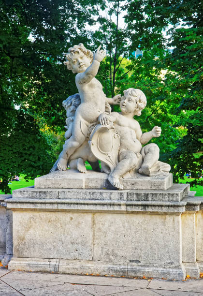 Angel putti statue in Burggarten park in Vienna, Austria.
