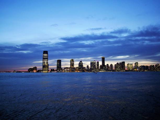istock Jersey City Skyline at sunset 667572802