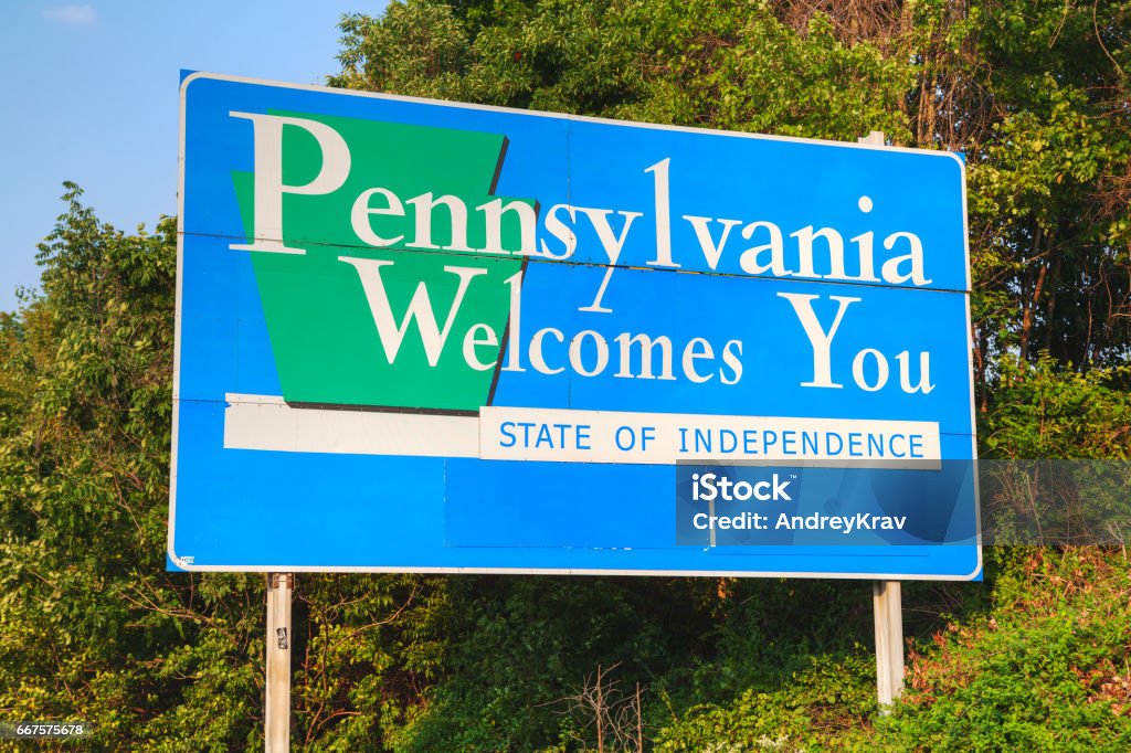 Pennsylvania Welcomes You road sign Pennsylvania Welcomes You road sign at the state border Pennsylvania Stock Photo