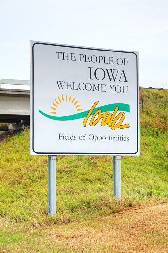 The People of Iowa Welcome You sign at the state border