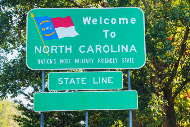 istock Welcome to North Carolina road sign 667576016