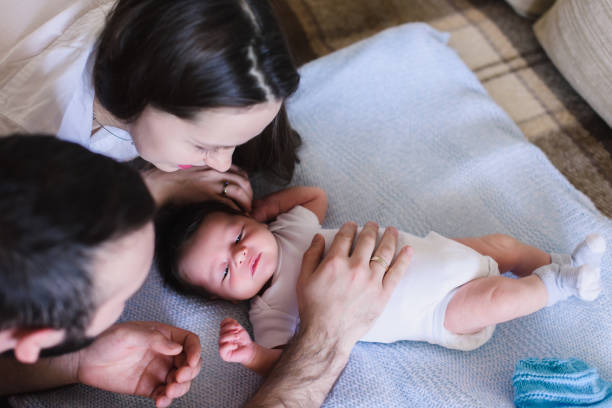 istock Parents with Newborn Baby Boy 667576168