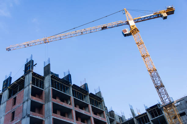 istock A new building is being constructed with use of tower crane. Jib 667576394