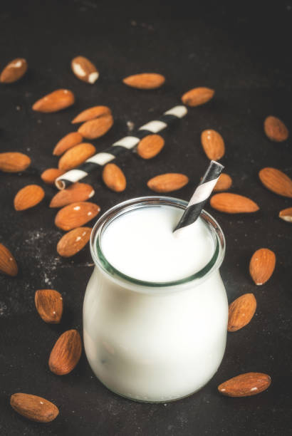 istock Small bottle of almond milk 667577180
