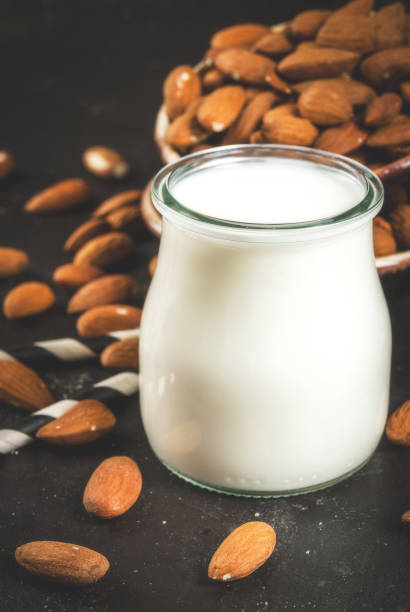 istock Small bottle of almond milk 667577292