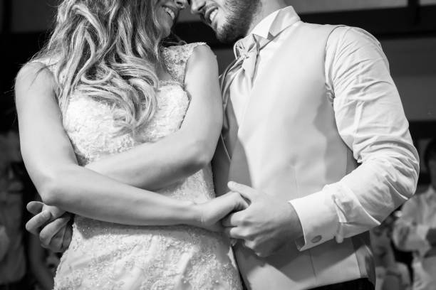istock first dance the bride and groom in the smoke 667580482