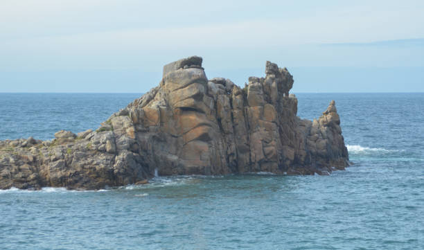 istock rock in the sea 667581234