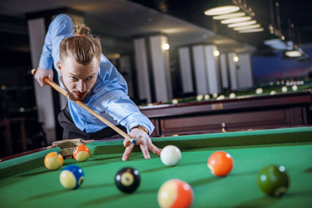 istock Young man is preparing to hit the ball 667581580