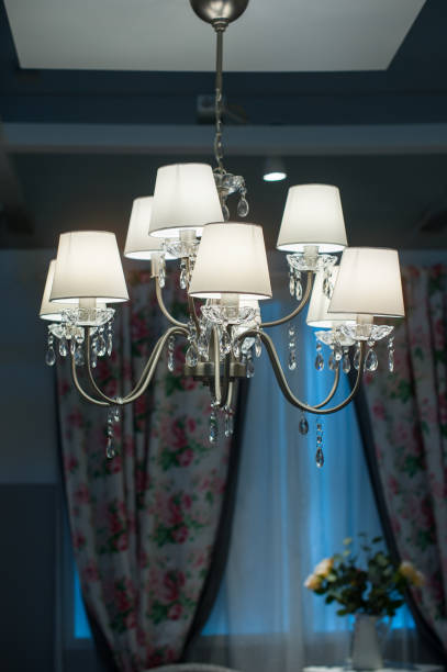 istock decorative designer chandelier on a dark background 667581900