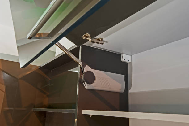 istock Closeup detail of a hinge on kitchen cupboard 667584362