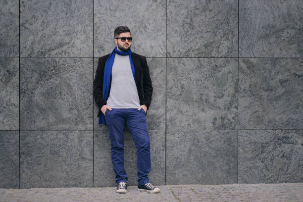 istock Handsome young man on a walk in town 667584936