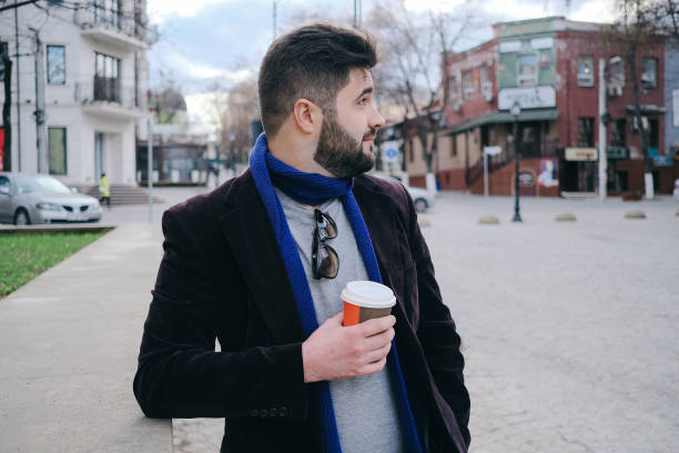 istock Handsome young man on a walk in town 667587718