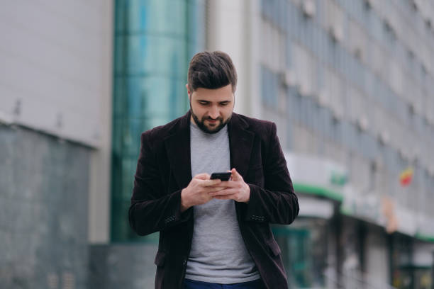 istock Handsome young man on a walk in town 667588058