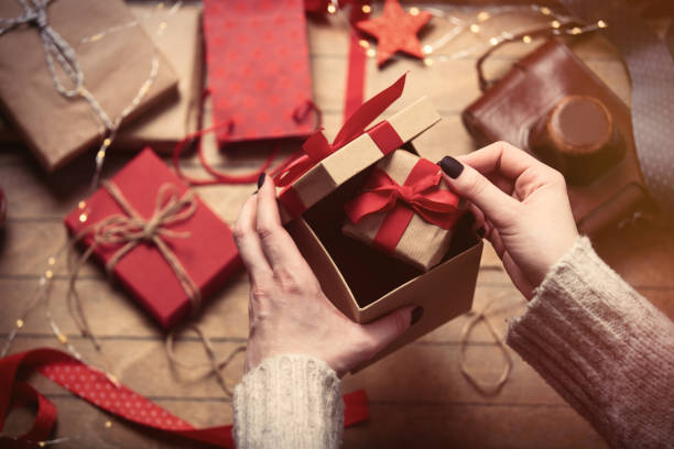 istock hands holding gifts 667591022