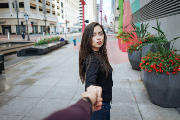 istock girl walks down the street 667596294