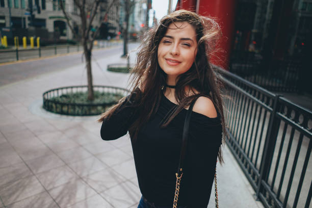 istock girl walks down the street 667598812
