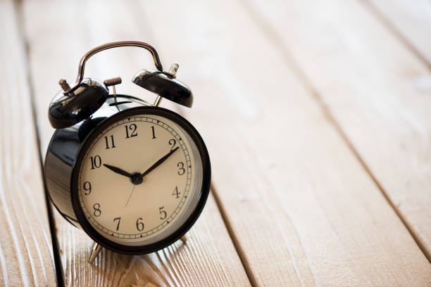 istock Time Concept With Alarm Clock On Desk 667606658