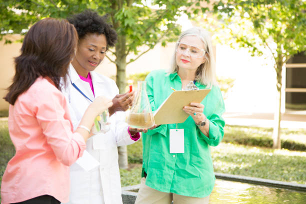 istock STEM themes with female scientists working on water project outdoors. 667613510