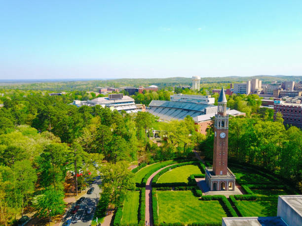 Aerial shot of UNC Campus Aerial shot at UNC of the campus bell tower and football stadium. chapel hill photos stock pictures, royalty-free photos & images
