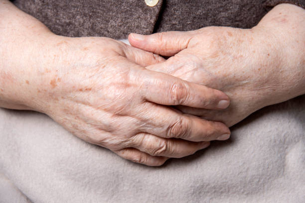 istock Hands Of Senior Woman 667614846