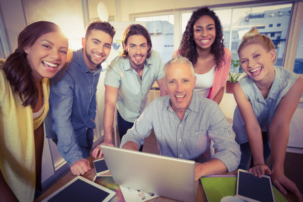istock Portrait of business people using technologies 667618150