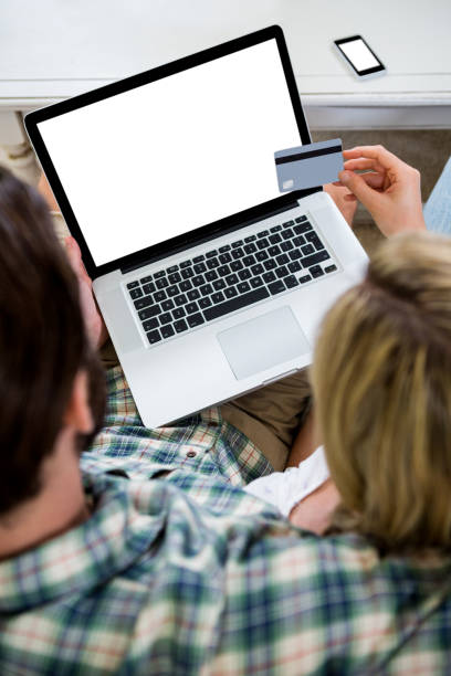 istock Cropped image of couple shopping online 667622076