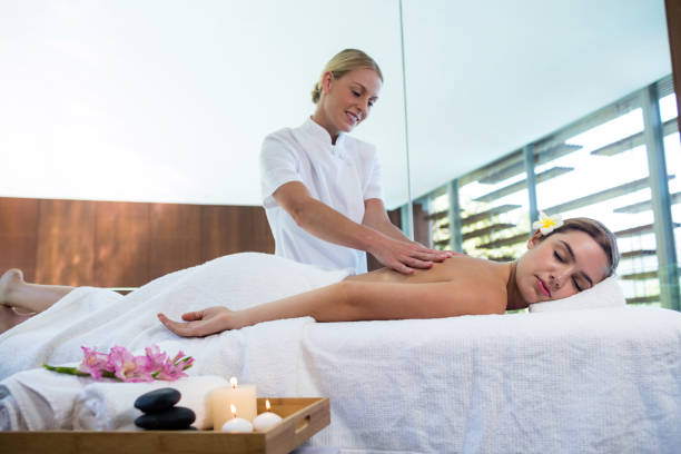 istock Woman receiving a back massage 667624854