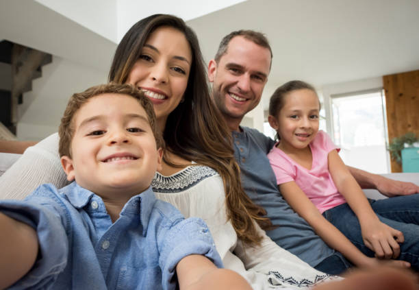 istock Family taking a selfie at home 667633138