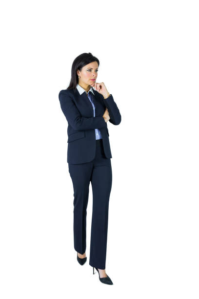istock Brunette businesswoman thinking with hand on chin 667645632