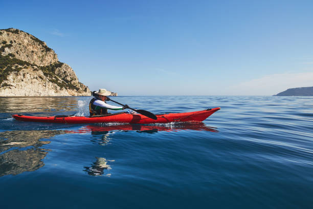 istock A man rowing on a sea kayak 667654048